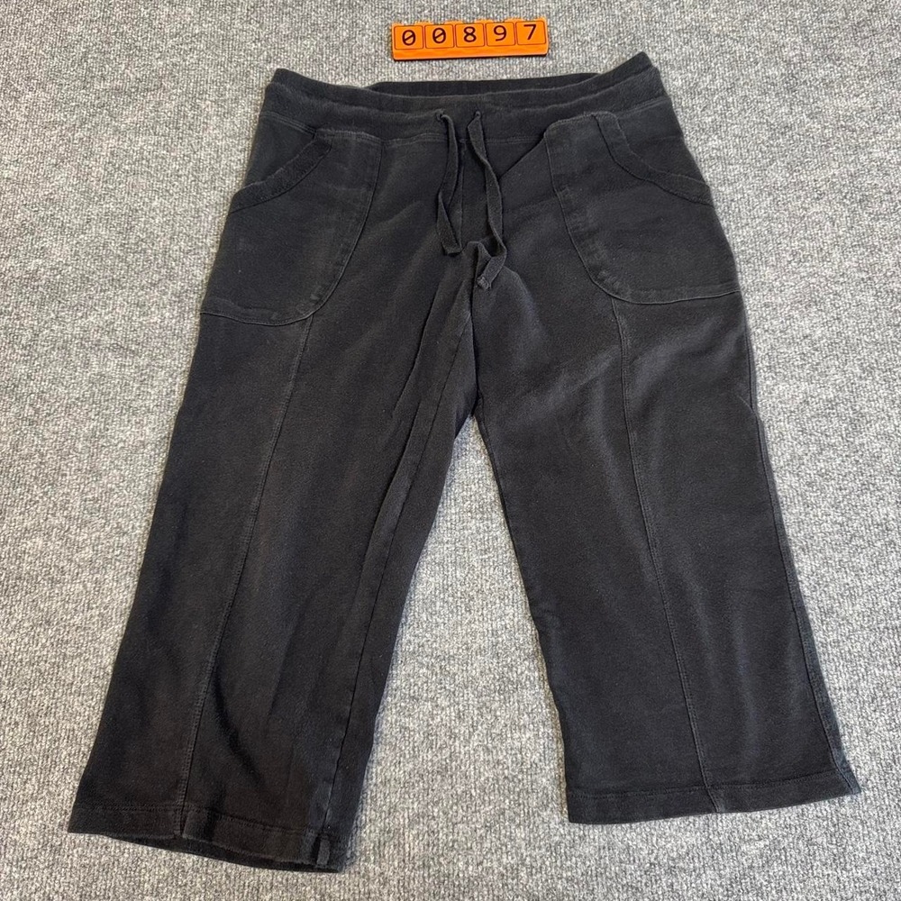 Eddie Bauer black capri sweatpants with drawstring waist, size M. Some wear.